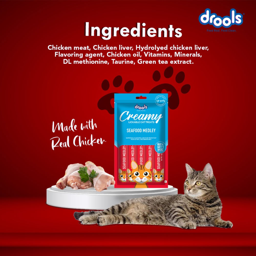 Drools Seafood Medley Creamy Cat Treats — in use