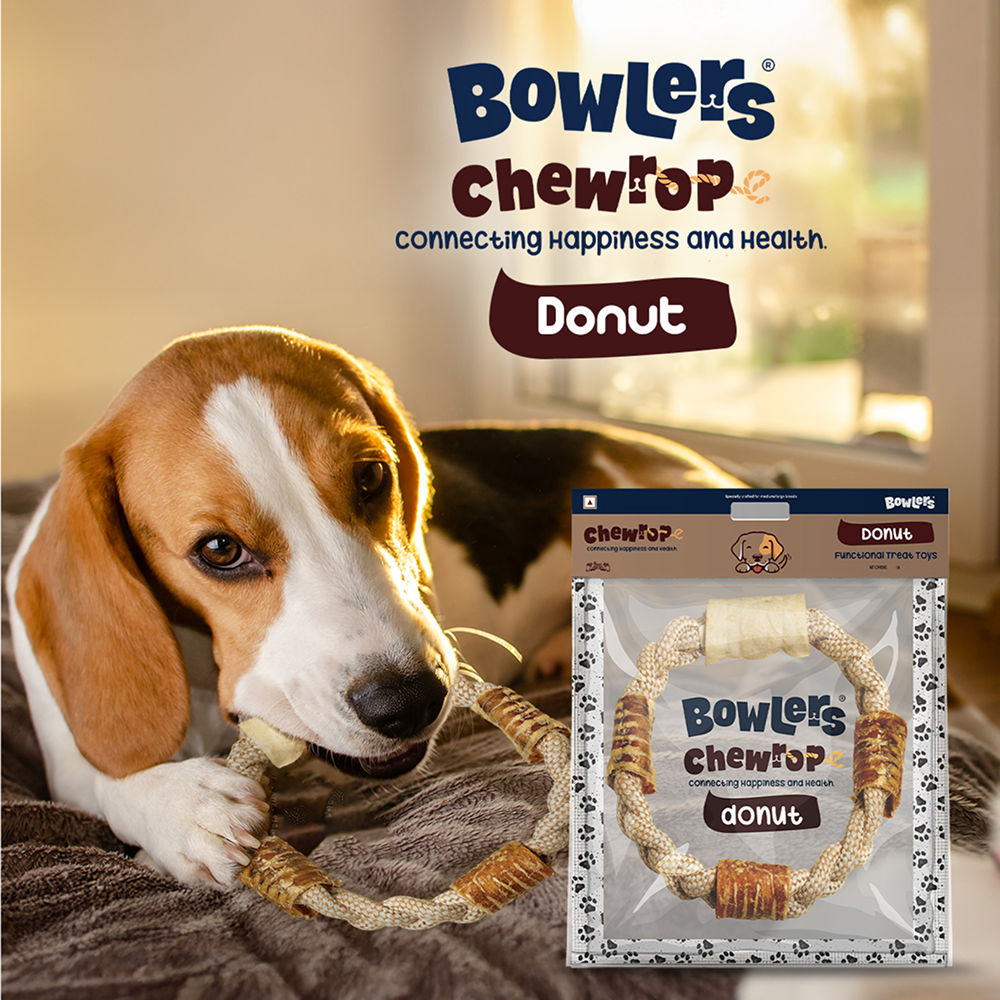 Bowlers Chewrope Donut Functional Dog Treat Toy — in use