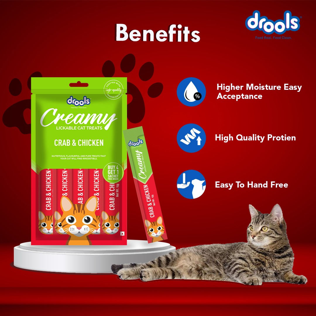 Drools Crab & Chicken Creamy Cat Treats — in use