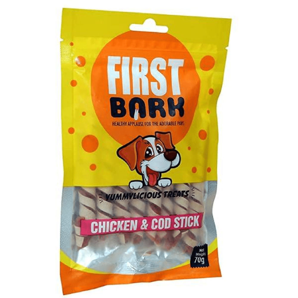First Bark Chicken Cod Stick Dog Treats — in use