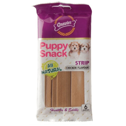 Gnawlers Puppy Snack Strip Chicken Flavoured Dog Treats — in use