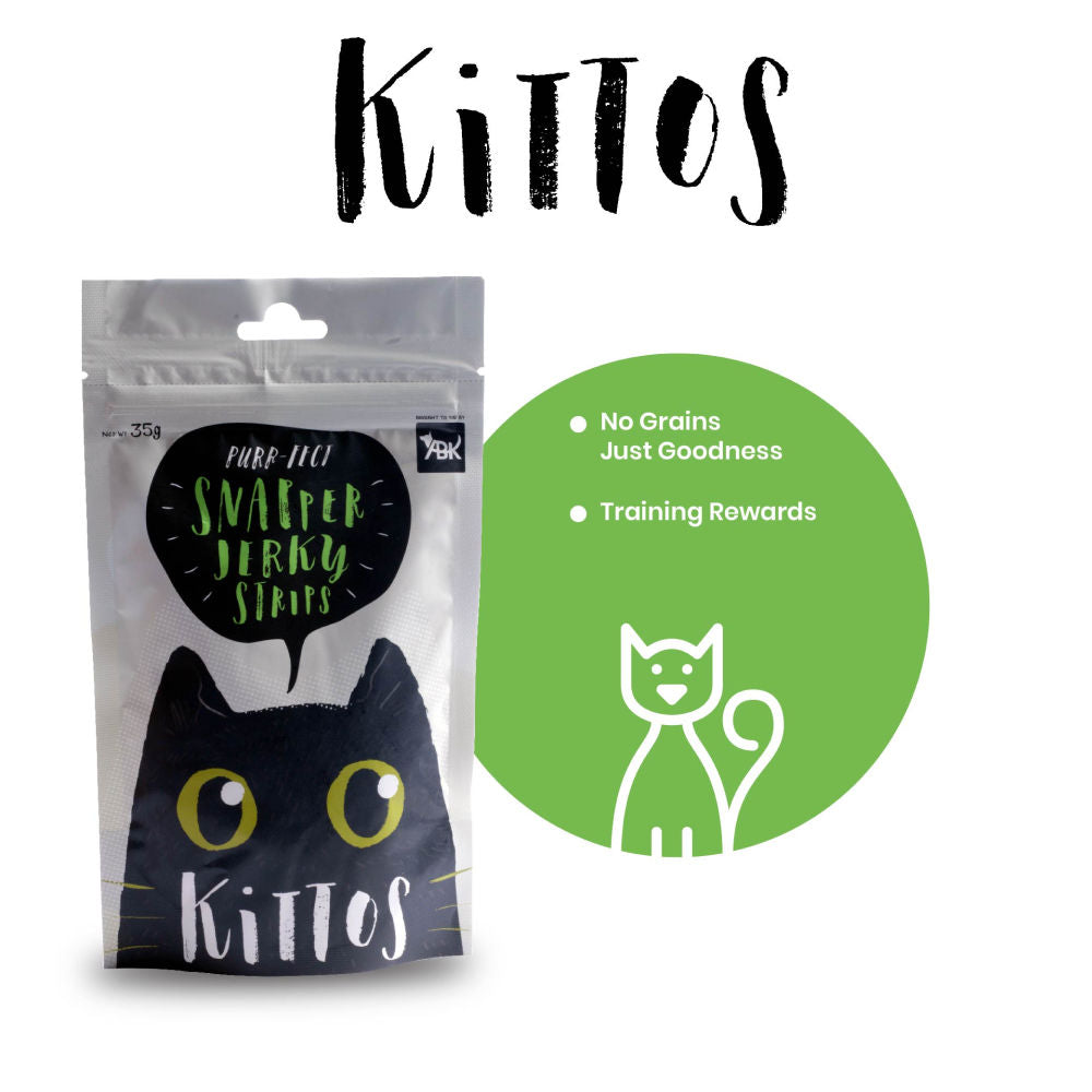 Kittos Purr Fect Snapper Jerky Strips Cat Treats — in use