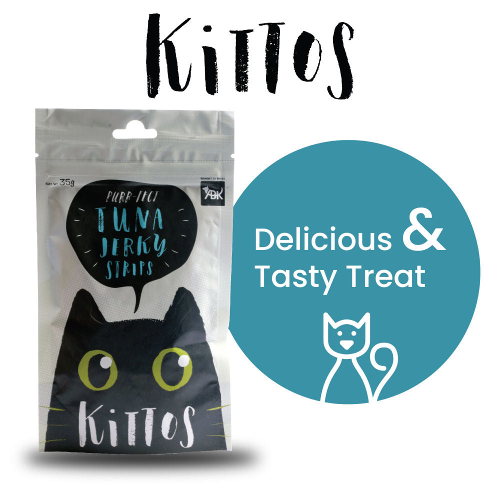 Kittos Purr Fect Tuna Jerky Strips Cat Treats — in use