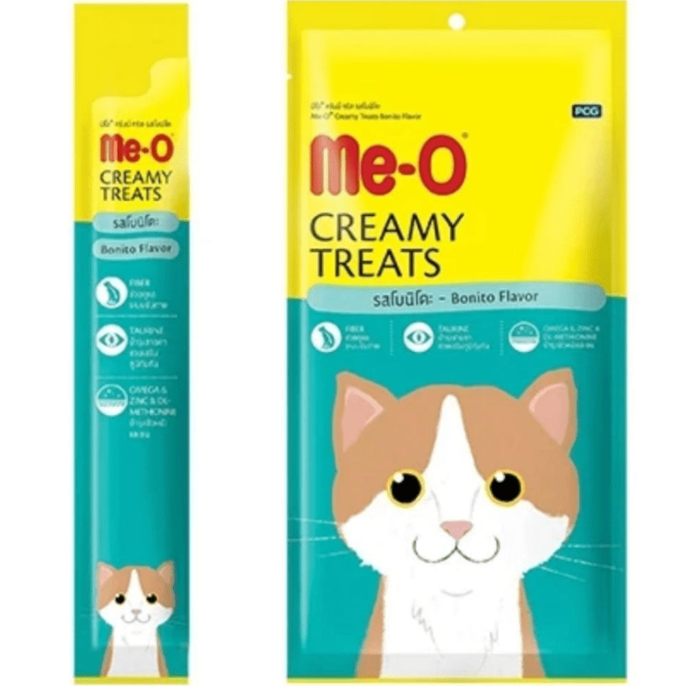 Me O Creamy Bonito Cat Treat — in use