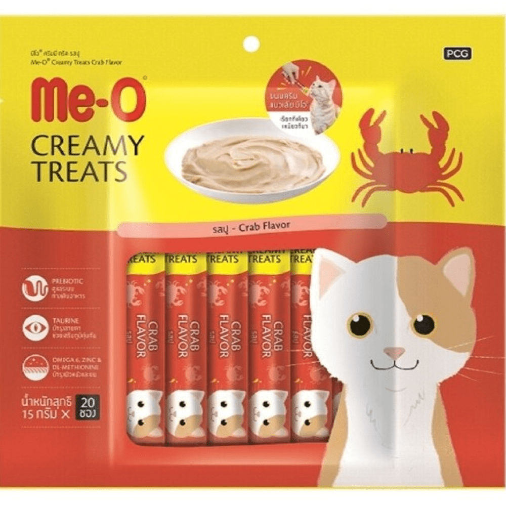 Me O Creamy Crab Cat Treats — in use