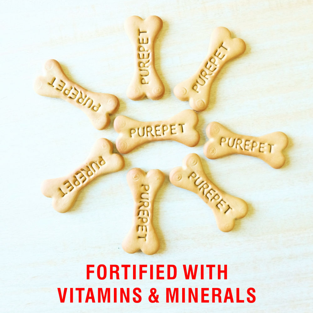Purepet Mutton Flavour Real Chicken Biscuit Dog Treats Pouch — in use
