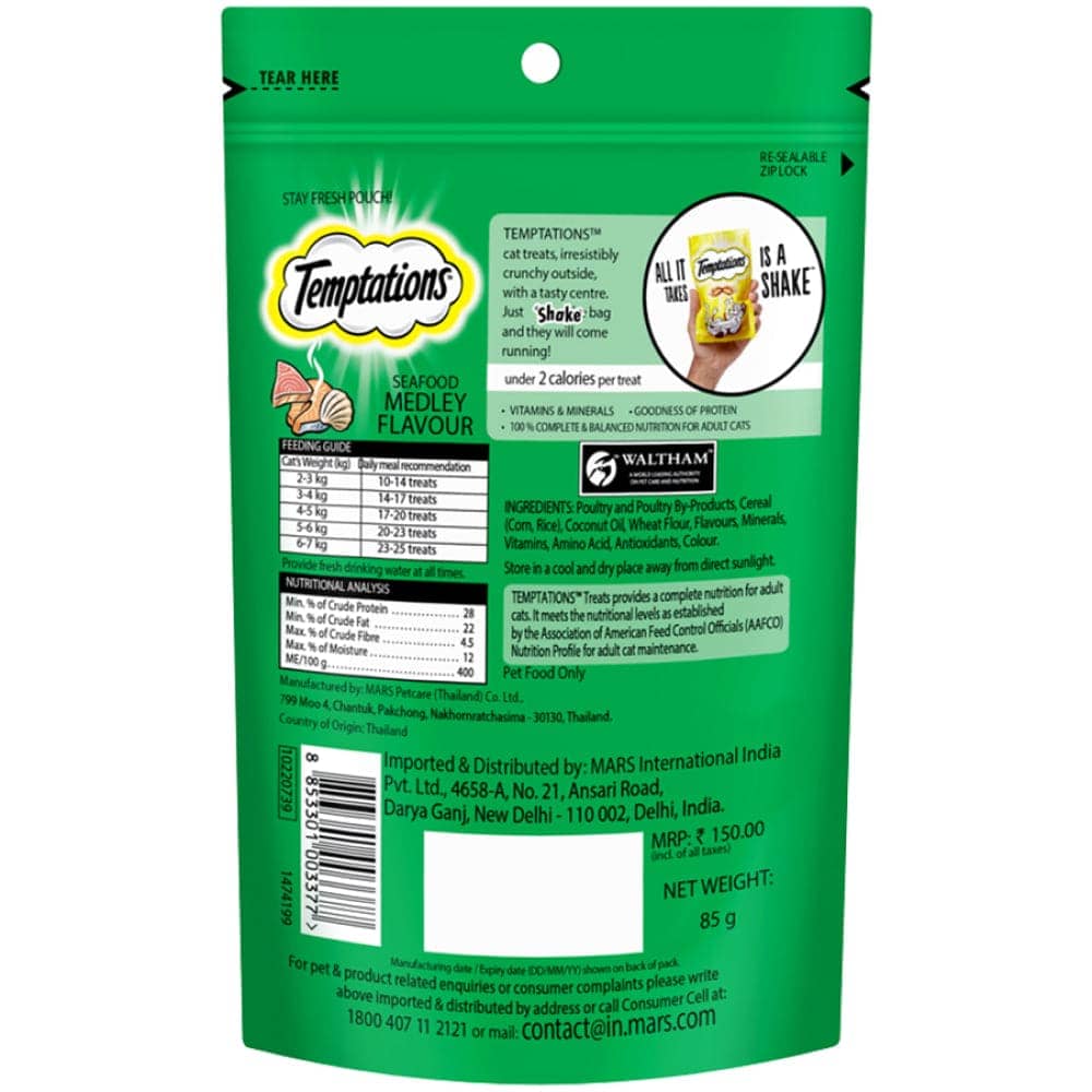 Temptations Tasty Chicken and Seafood Medley Flavour Cat Treats Combo — in use