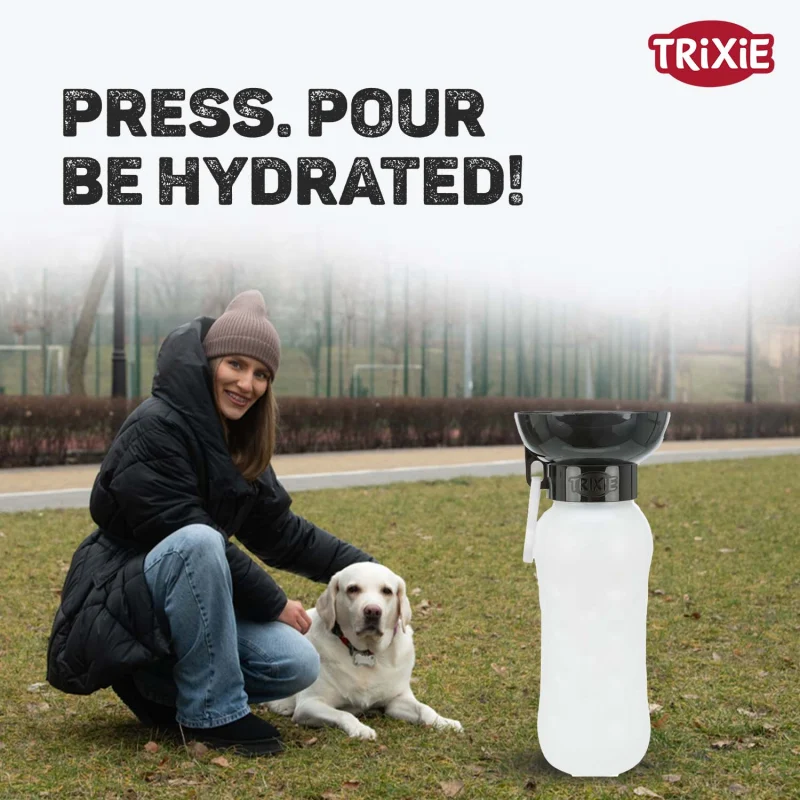 Trixie Travel Bottle with Bowl for Dogs and Cats — in use